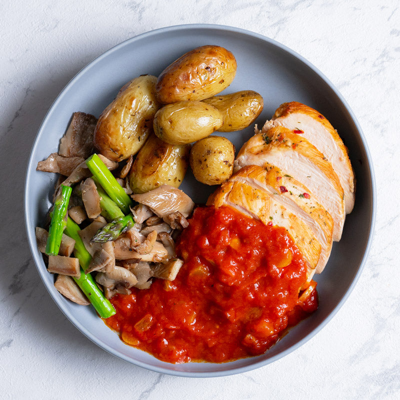 Pavo en salsa de tomate al ajillo