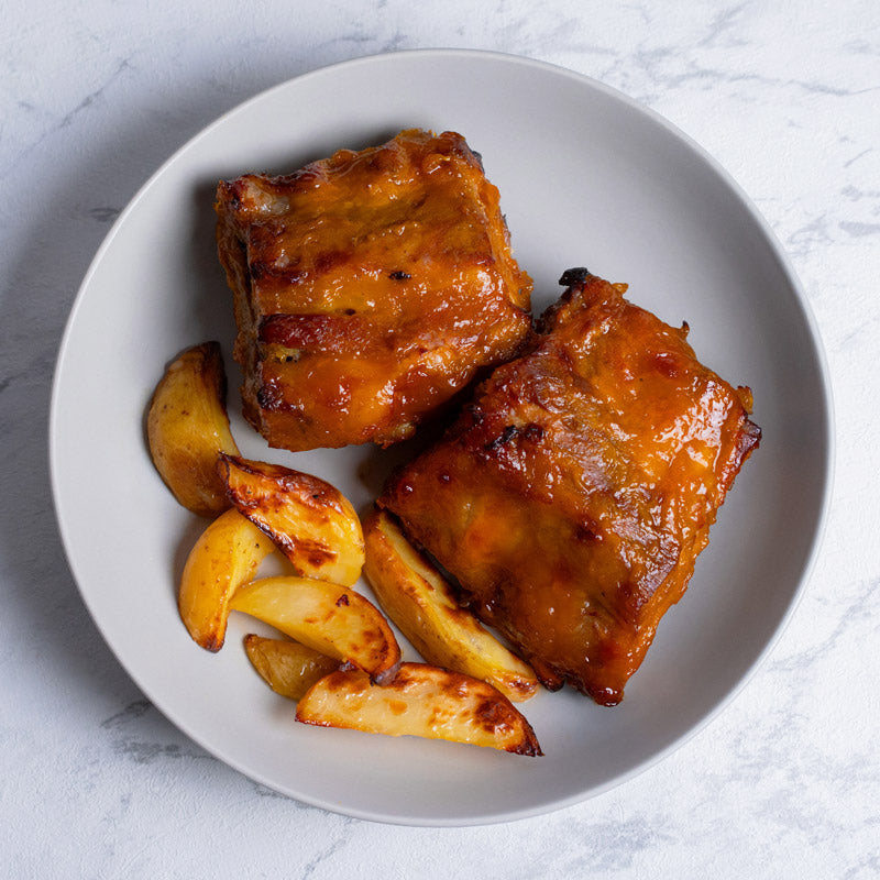 Costilla en salsa de mango con patatas