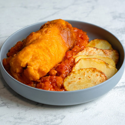 Merluza a la romana con pisto y patata