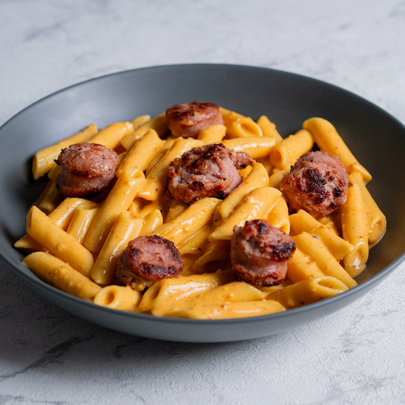 Penne rigate al romescu con longaniza catalana