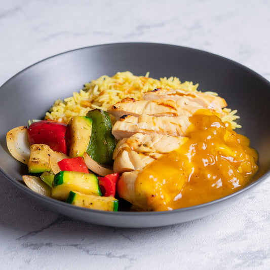 Pollo en salsa a la naranja