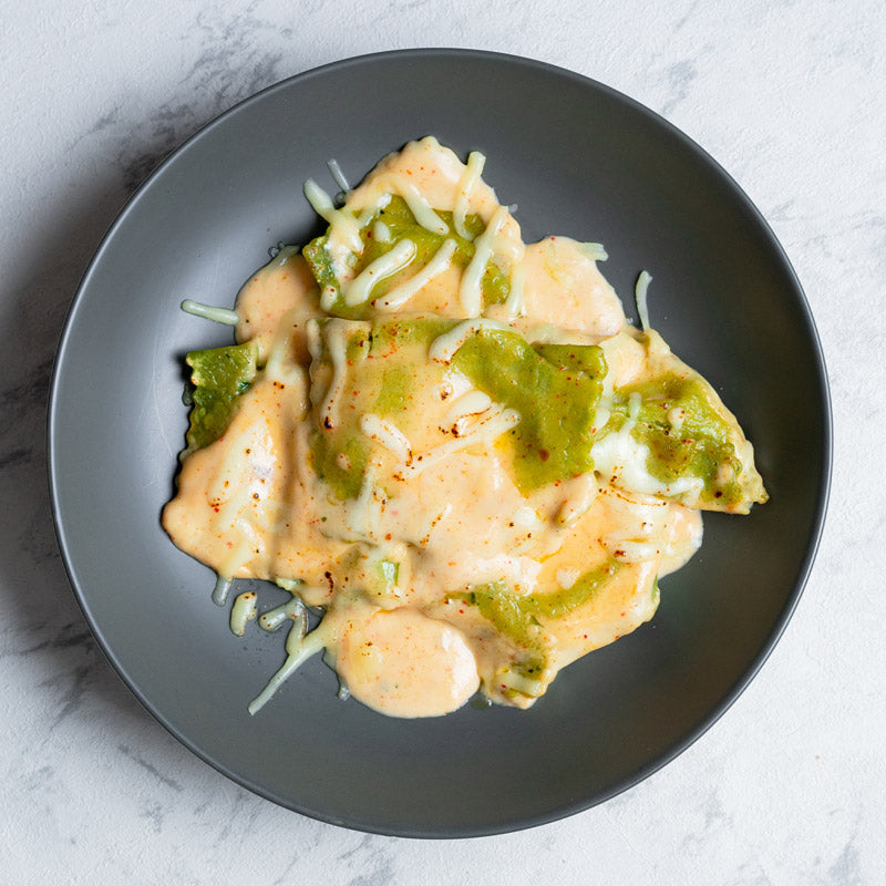 Raviolis en salsa al kimchi gratinados