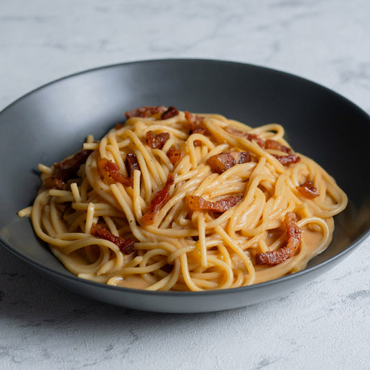 Spaghettis cacio e pepe con guanciale