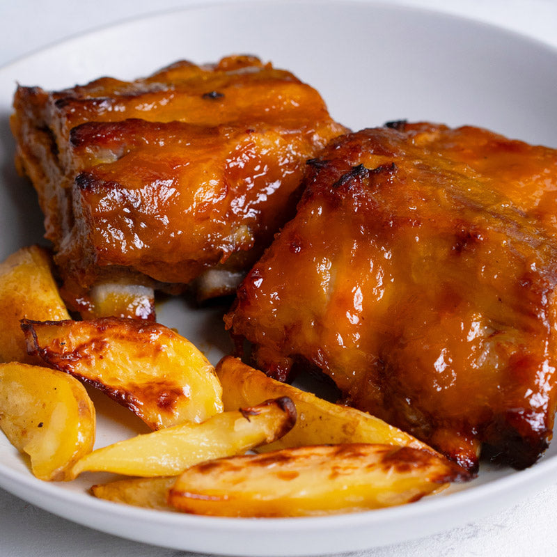 Costilla en salsa de mango con patatas