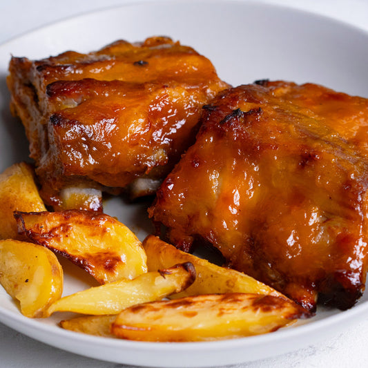 Costilla en salsa de mango con patatas