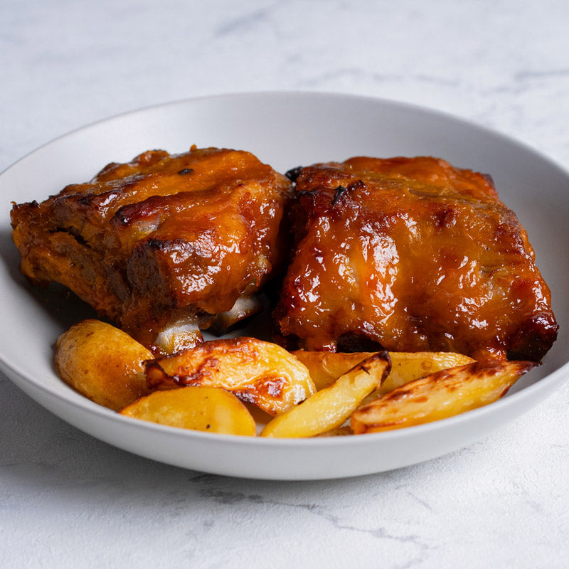 Costilla en salsa de mango con patatas