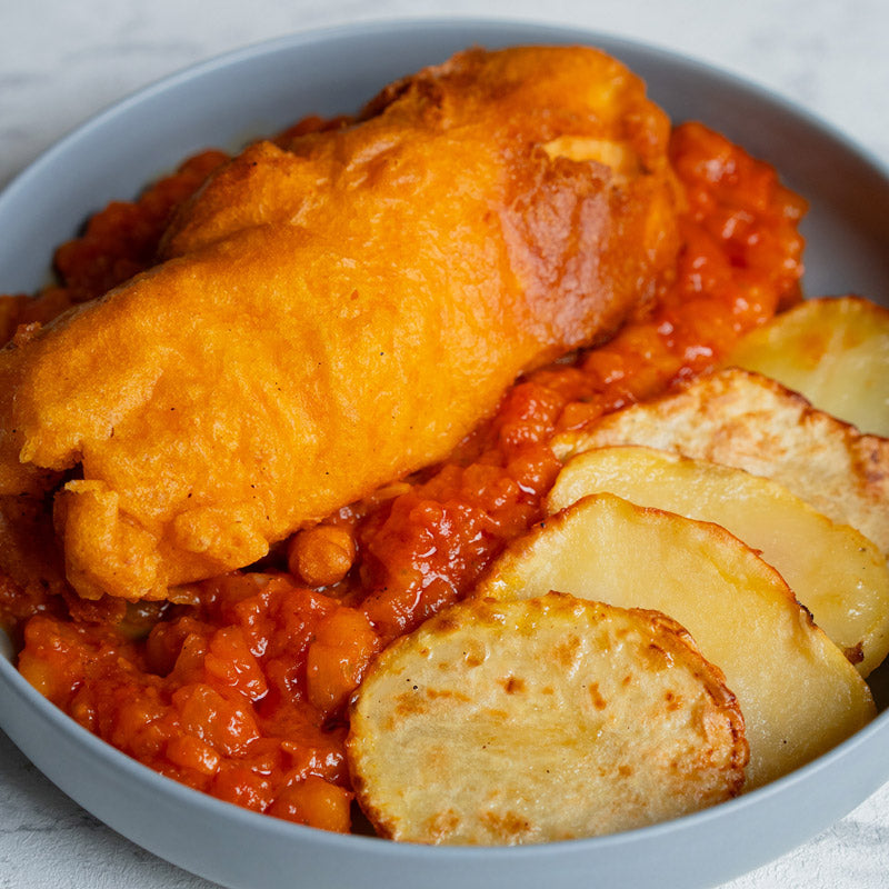 Merluza a la romana con pisto y patata