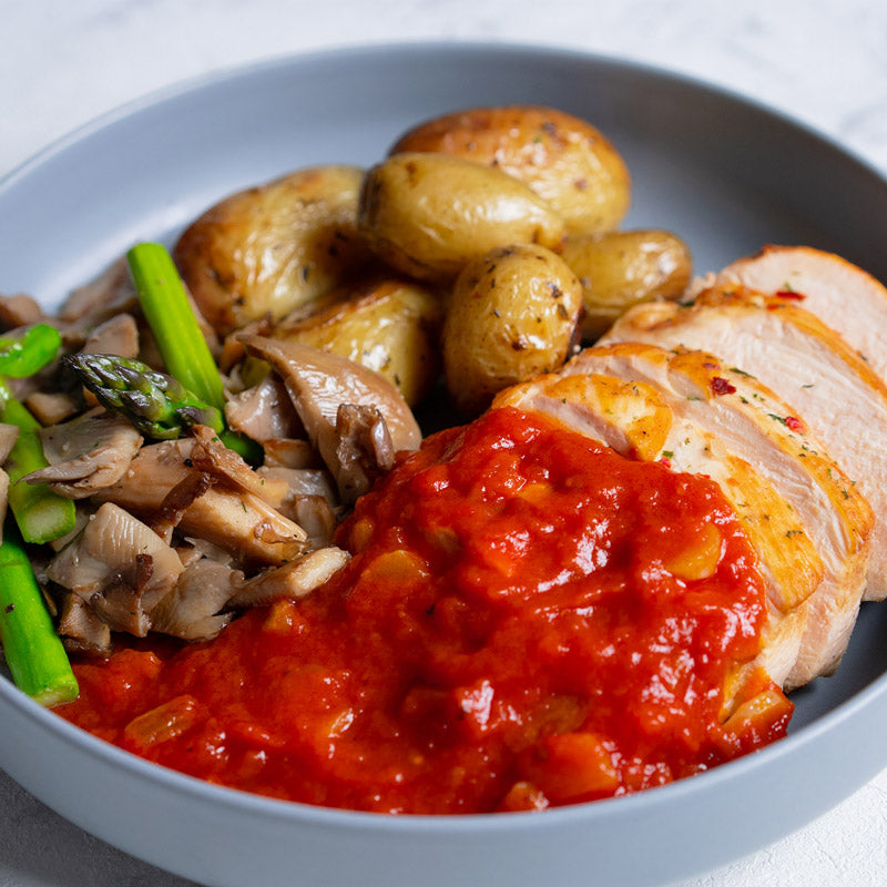 Pavo en salsa de tomate al ajillo