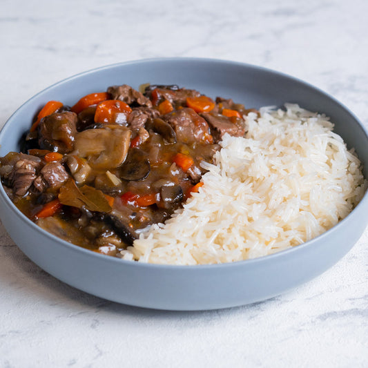 Ternera guisada con champiñones